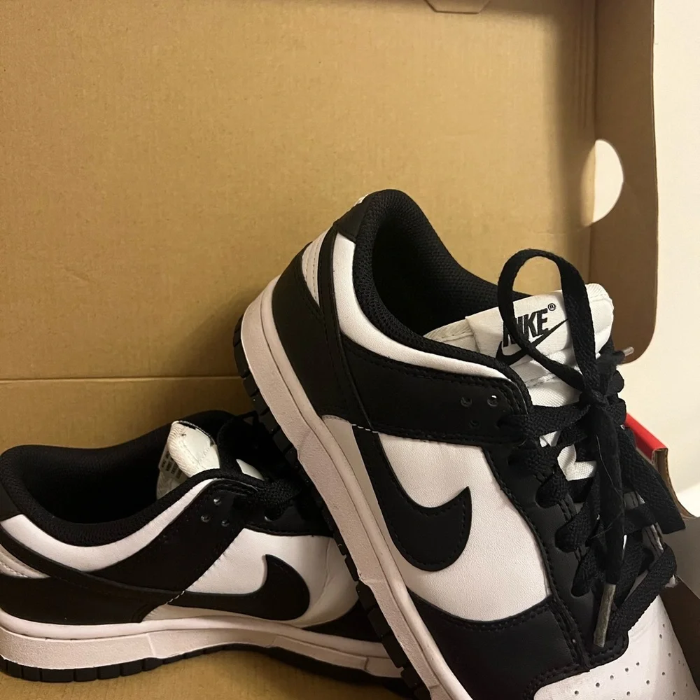 Nike Women’s Black and White Low-Top Sneakers